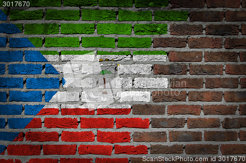 Image of Brick wall texture with flag