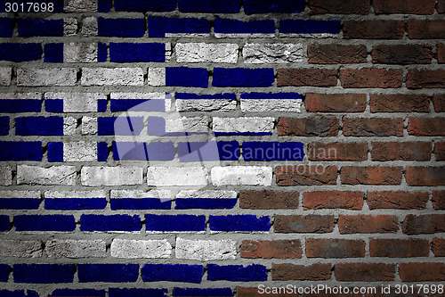 Image of Brick wall texture with flag