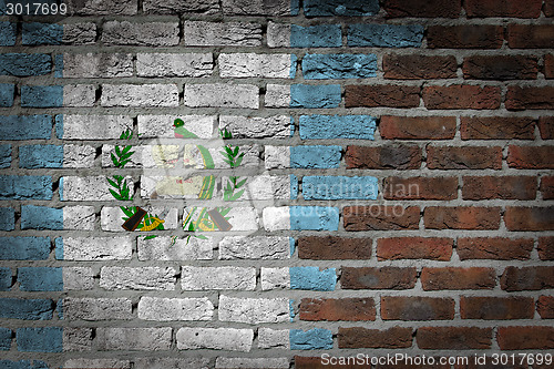 Image of Brick wall texture with flag