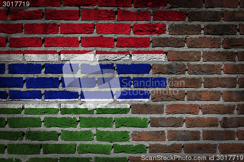 Image of Brick wall texture with flag