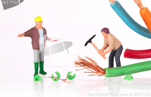 Image of Miniature worker with pickaxe