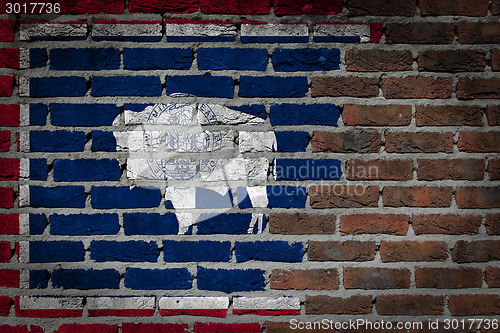 Image of Brick wall texture with flag