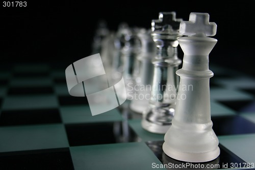 Image of Chess Pieces fading into the background