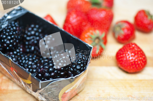 Image of Fresh strawberries and blackberries