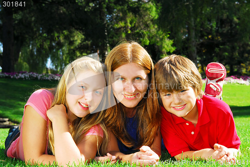 Image of Family relaxing in a park