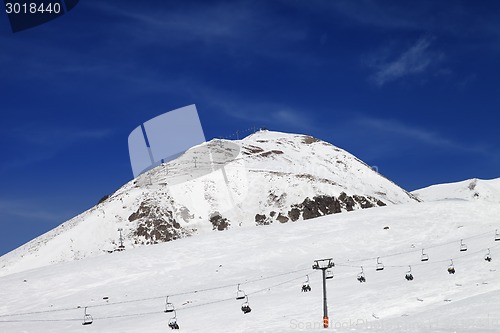 Image of Winter mountains and ski slope at nice day