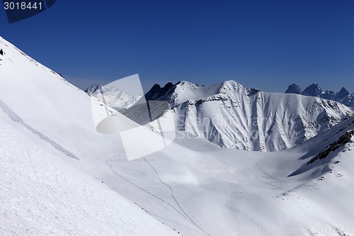 Image of View on snowy off piste slope with trace from avalanche