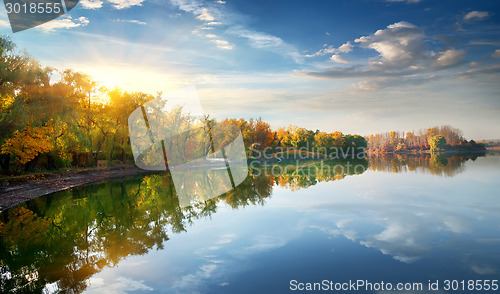 Image of Morning sun over lake