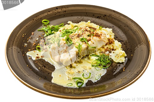Image of White fish in sauce