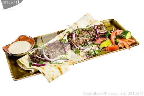 Image of Kebab with pita bread
