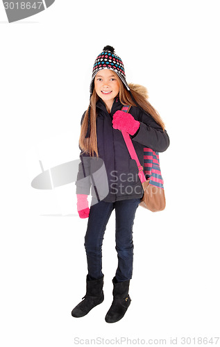 Image of Young girl going to school.