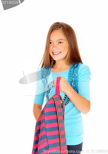 Image of Girl holding her backpack.