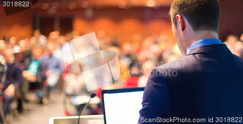 Image of Public speaker at Business Conference.