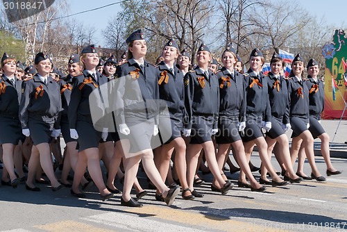 Image of Female cadets of police academy marching on parade