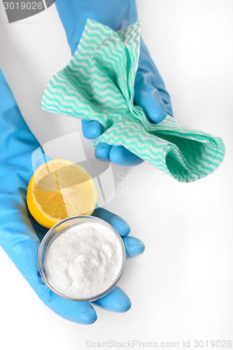 Image of lemon, baking soda and cleaning cloths