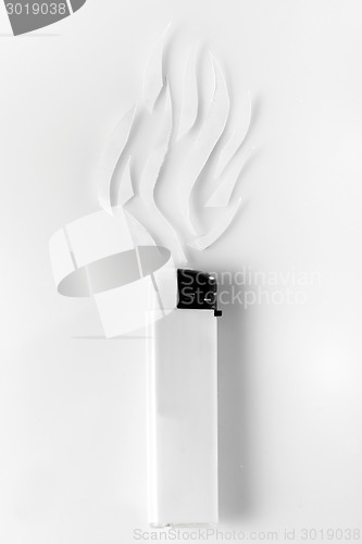 Image of white lighter and abstract smoke