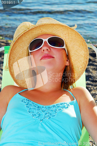 Image of Teenage girl in a hat