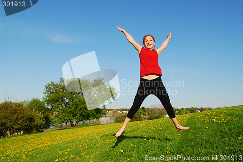 Image of Young girl jumping