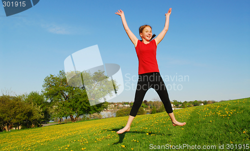 Image of Young girl jumping