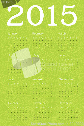 Image of Calendar 2015 on green leaf texture. Vector