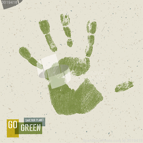 Image of Go Green Concept Poster. Handprint on recycled paper texture, ve