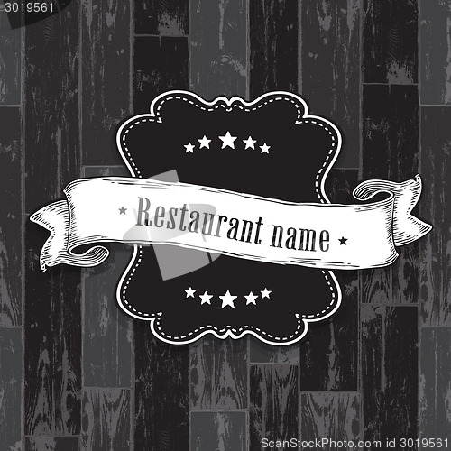 Image of Vintage label on wooden texture. Design elements, EPS10