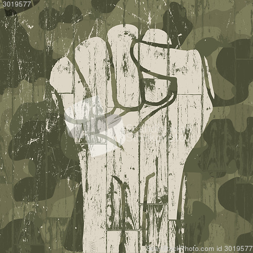 Image of Fist symbol (revolution) on military camouflage background. Vect