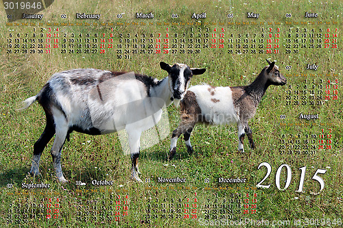 Image of calendar for 2015 year with goat and kid