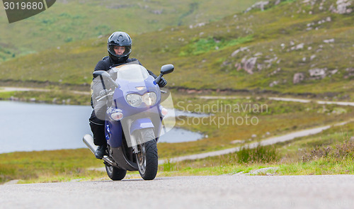 Image of Motorcyclist in the Scottish Highlands