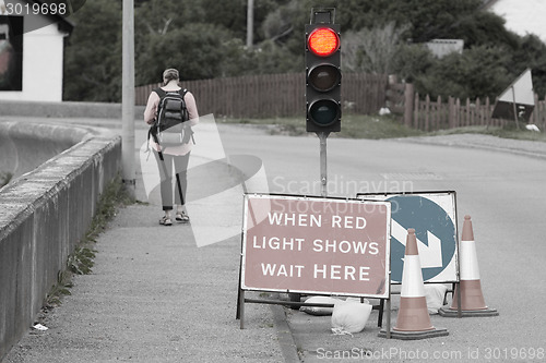 Image of Emergency traffic light with sign