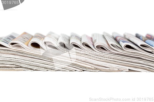 Image of Assortment of folded newspapers