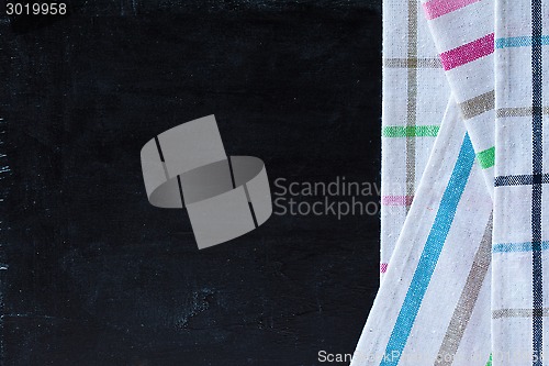 Image of tablecloth textile on blackboard