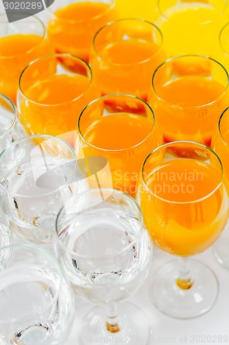 Image of many glasses on buffet table