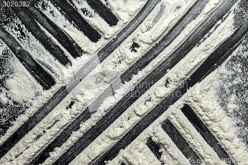 Image of White flour on black background