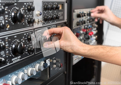 Image of Closeup photo of an audio mixer