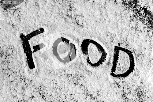 Image of White flour on black background