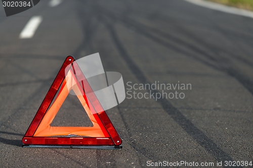 Image of Red triangle of a car