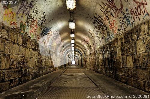 Image of Dark undergorund passage with light