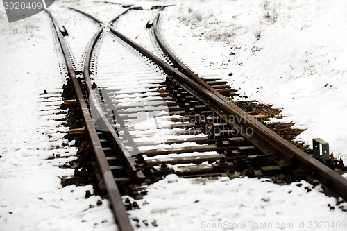 Image of Railroad tracks in the snow