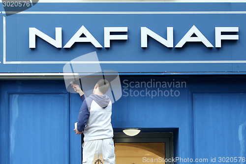 Image of Worker wall painting NAF NAF store