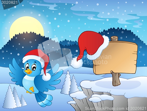 Image of Christmas theme with bird and sign