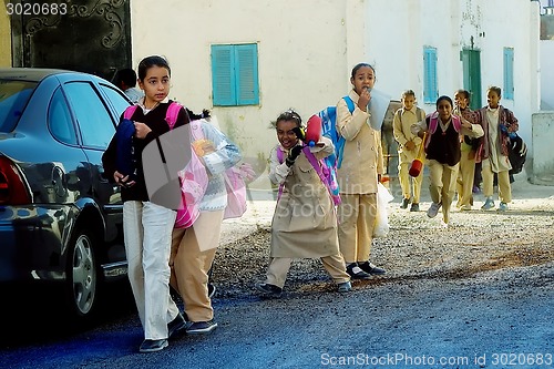 Image of Pupils come back home from school