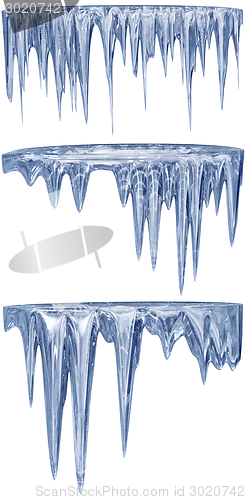 Image of set of hanging thawing icicles of a blue shade