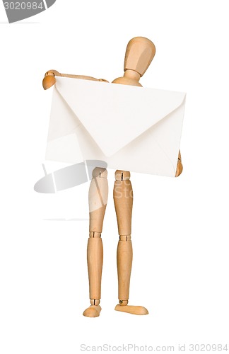 Image of Wooden model dummy holding envelop