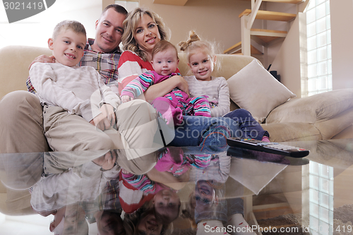 Image of happy young family at home