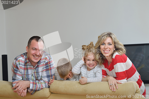 Image of happy young family at home