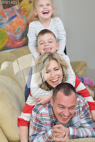 Image of happy young family at home