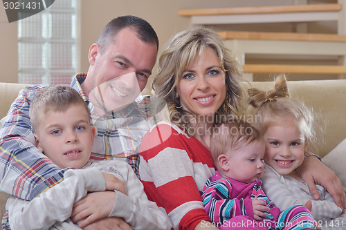 Image of happy young family at home