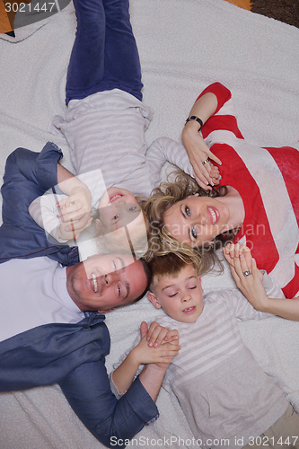 Image of happy young family at home