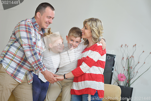 Image of happy young family at home